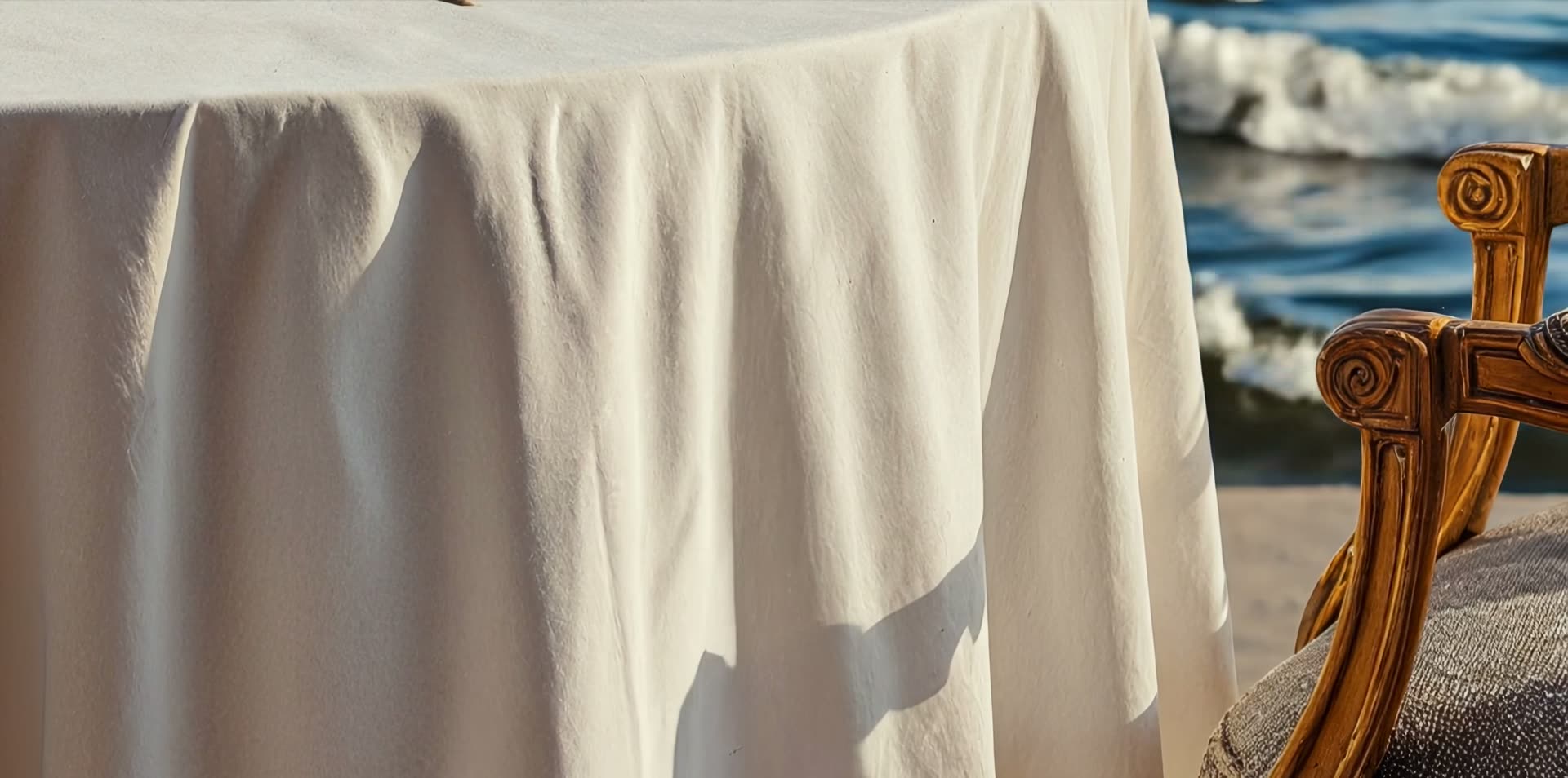 White table linen set for dinner by the sea