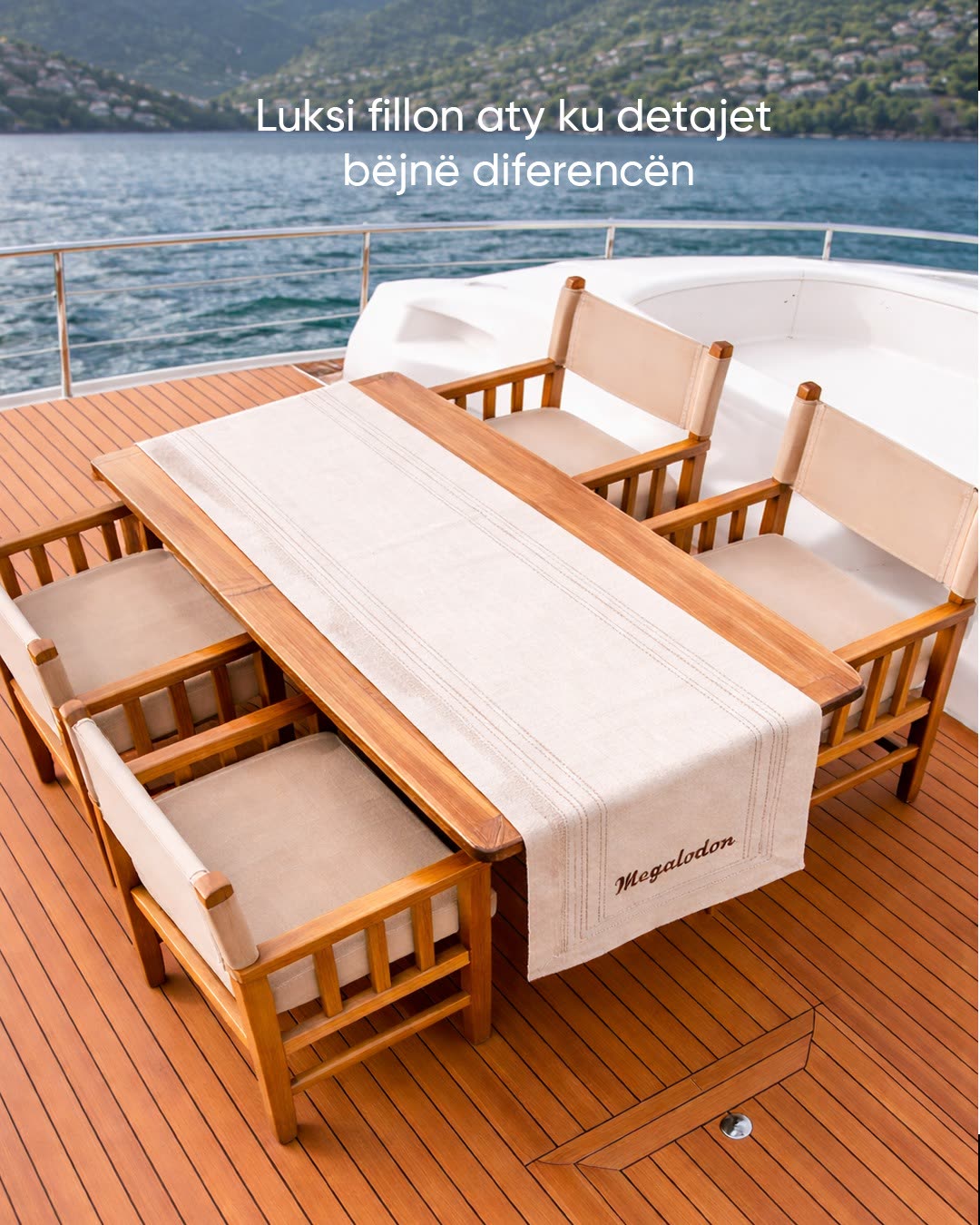 Deck table dressed with a white Megalodon-embroidered runner