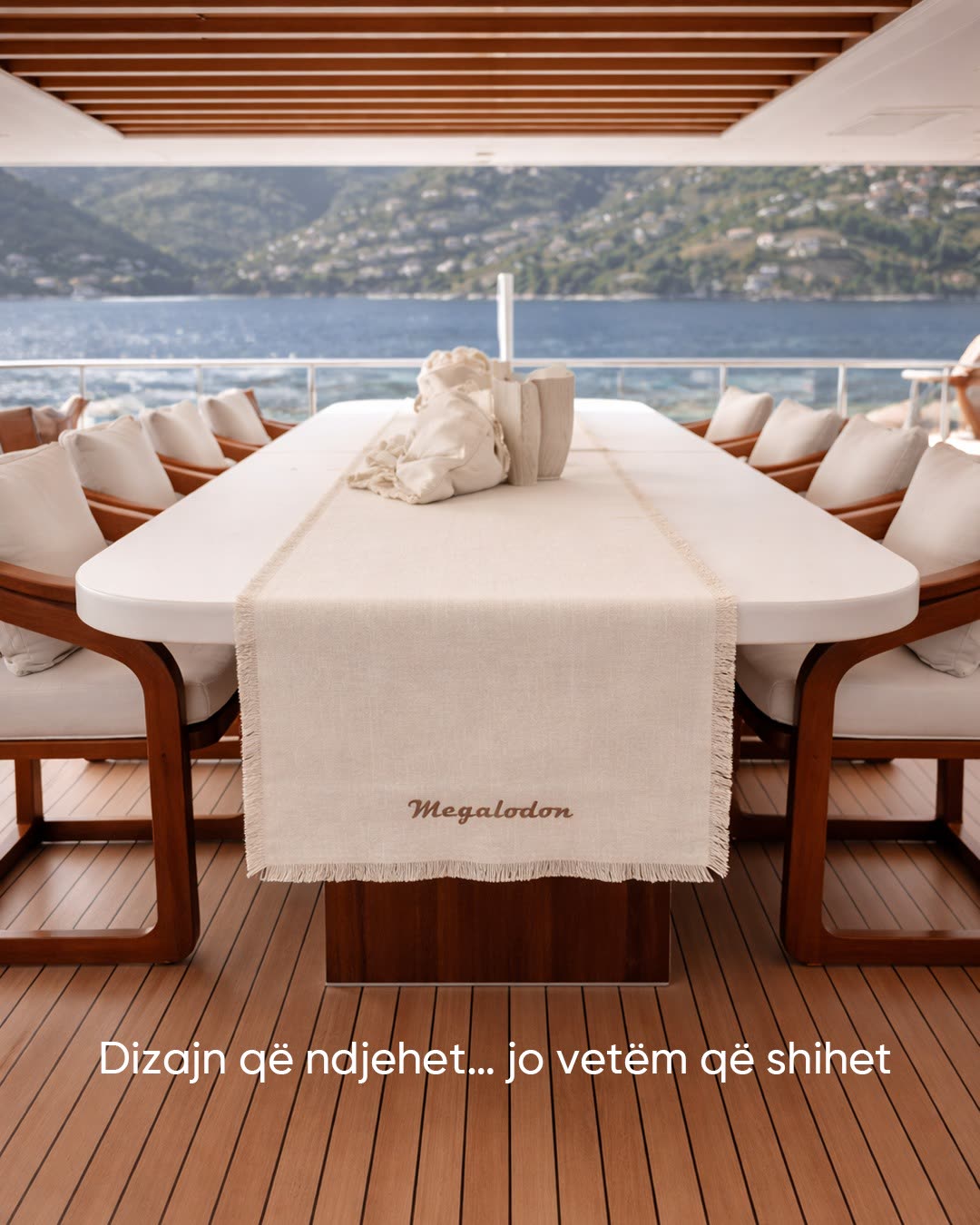 The aft dining table dressed in a white Megalodon runner