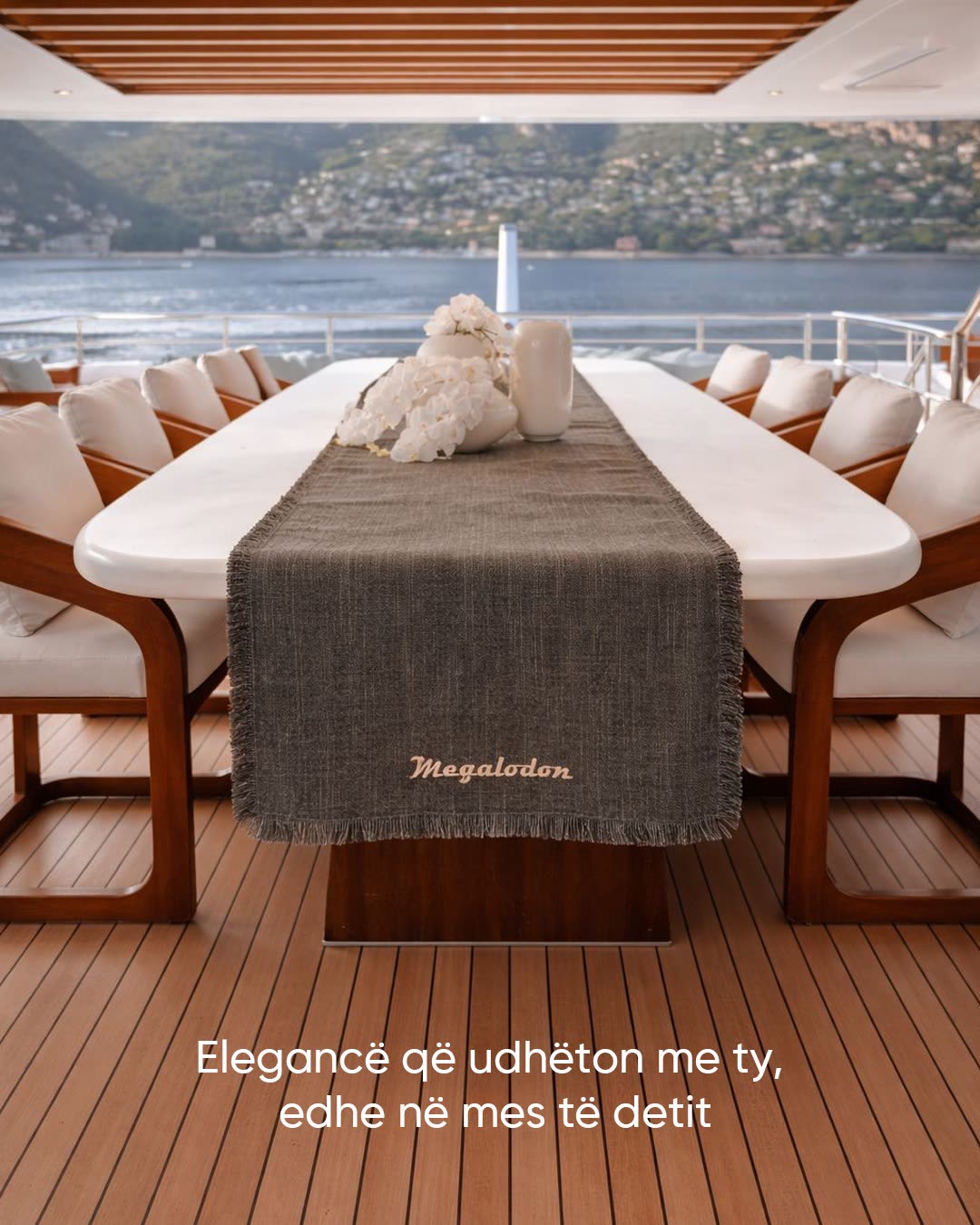 The same table dressed in the grey runner of the collection
